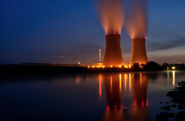A nuclear power plant at night